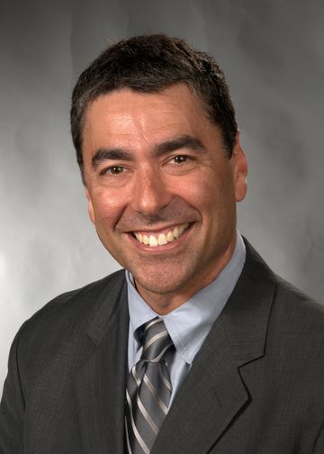 David Langer, MD, wearing a grey tie